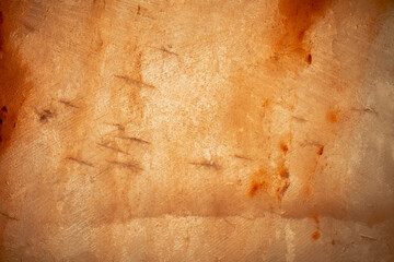 Himalayan salt surface. Natural crystal pink salt background. Mineral sea salt crystal for cooking, seasoning, medicine, spa, health. Close up texture and pattern of orange red Himalayan salt stone.