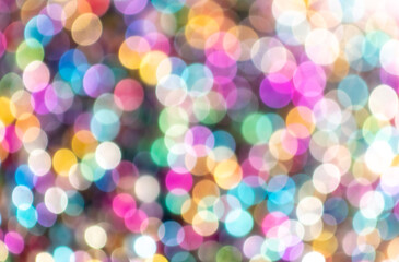 Multicolored festive bokeh as background.