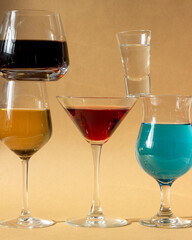 Alcoholic cocktails on a beige background. Bar. Alcohol.