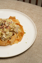 Fried shrimps and mushrooms with creamy cheese