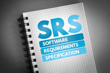 SRS - Software Requirements Specification acronym on notepad, technology concept background - obrazy, fototapety, plakaty