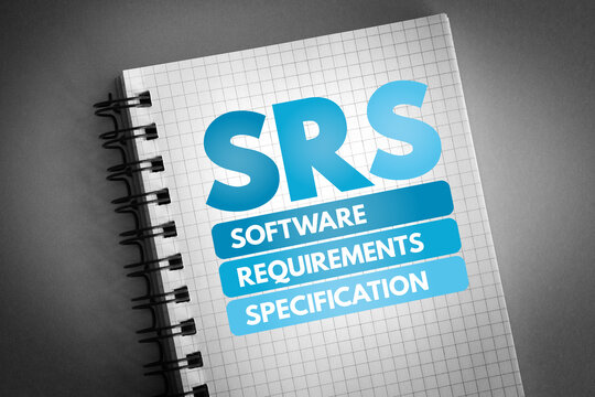 SRS - Software Requirements Specification acronym on notepad, technology concept background