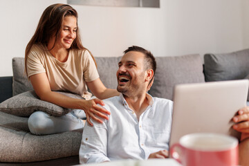 Couple spending leisure time at home