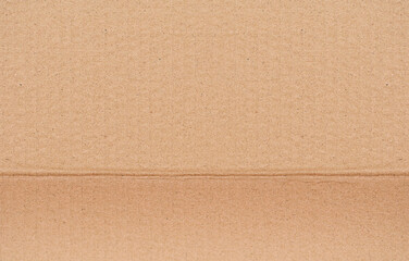 Fototapeta premium High Resolution Cardboard Brown Corrugated Texture, with a bend line