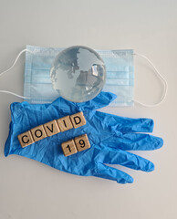 Covid-19 world medical problem and glove closeup