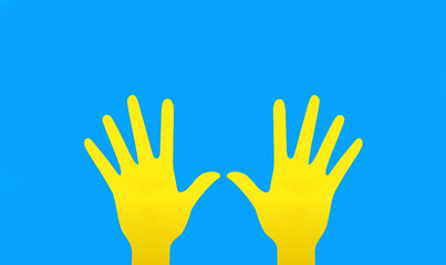 Support for Ukraine. Yellow hands on a blue background. Help Ukraine