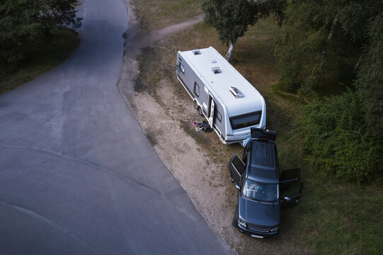 High angle view of car with camper van