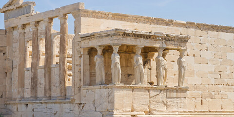 Figures of the Caryatid Porch of the Erechtheion on the Acropolis at Athens. Sunny day no people. close up