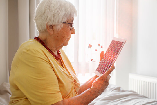 Senior woman using digital tablet
