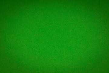 Dark deep green texture background with vignette