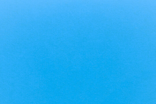 sky royal blue paper background with vignette