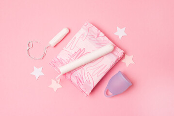 Pads Menstrual Cup Tampon on Pink Background Concept of Critical Days Menstruation Horizontal
