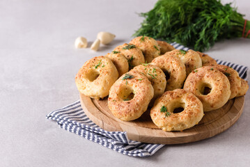 Homemade Cheese Donuts with Spices on Wooden Tray Gray Background Copy Space