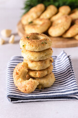 Stack of Homemade Cheese Donuts with Spices on Napkin Close Up Vertical