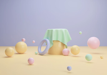 support with green fabric and colored spheres on a blue and yellow background