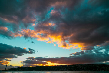 Fototapeta na wymiar sunset over sea. amazing natural clouds