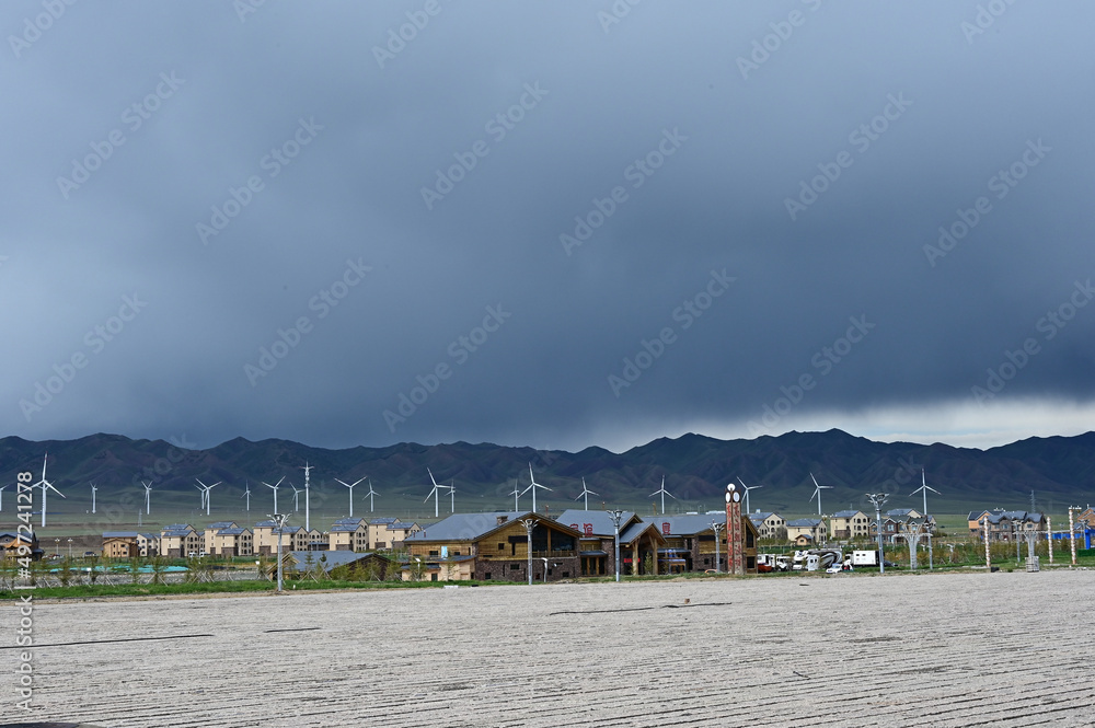 Sticker electric power system working under the cloudy sky in the grassland and mountains