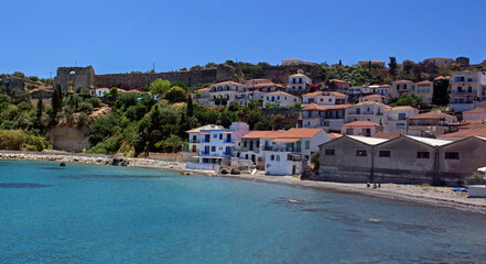Fototapeta na wymiar olourful houses under the Castle of Koroni, a coastal town in Messenia, Peloponnese, Greece. 