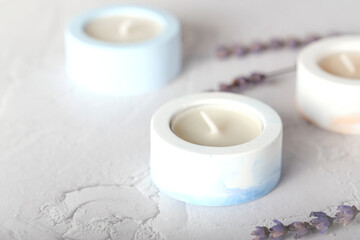 Fototapeta na wymiar the plaster candlestick is round. tea candle. interior candle holder with your own hands.
