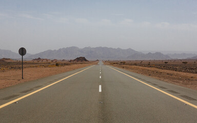 Beautiful view of the long road in the distance in the desert of Saudi Arabia