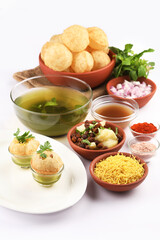 Panipuri or Golgappa is a popular street snack from India. It's a round, hollow puri filled with a mixture of flavoured water and other chat items