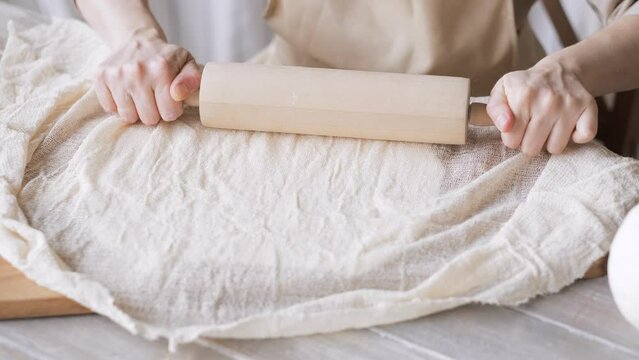 Handcraft woman master modeling cold porcelain, hands with rolling pin, creative workshop, Girl sculpts from porcelain, hobby for the soul scandinavian and boho style interior decor