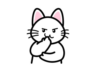 にやりと笑って悪だくみをする猫