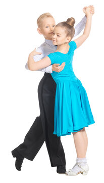 Sports ballroom dancing. Couple of kids, boy and girl  on isolated white background