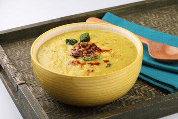 Indian popular food Dal fry or traditional Dal Tadka Curry or yellow lentil curry