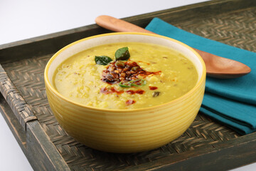 Indian popular food Dal fry or traditional Dal Tadka Curry or yellow lentil curry