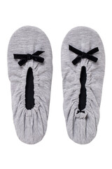 Slippers isolated. Close-up of a pair of female gray warm and soft cosy slippers with non-slip sole isolated on white background. Shoes of a woman. Macro.