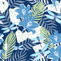 Seamless pattern with flowers lily, tropical leaves and dragonfly on blue background.