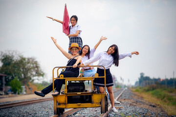 group of different asian woman happiness lifestyle on railway track