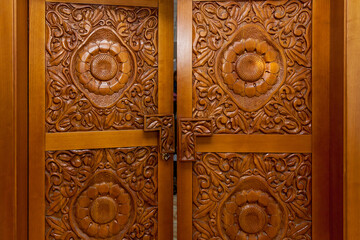 Wooden door with carved patterns