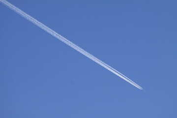 Airplane in the blue sky