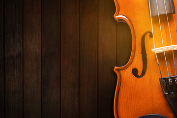 Musical instrument, violin Classical instrument on wooden background.