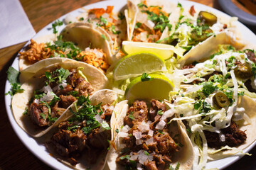 Party plate of authentic Mexican meat taco - carne asada, carnitas and barbacoa