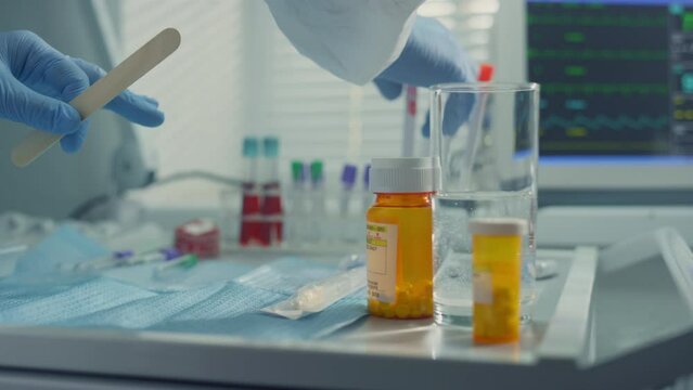 Doctor preparing covid swab tool in clinic. Medical equipment laboratory closeup