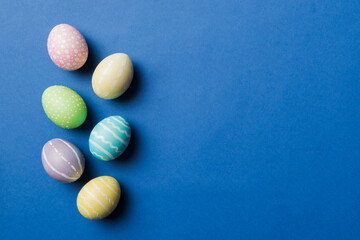 holiday preparation Multi colors Easter eggs on colored background . Pastel color Easter eggs. holiday concept with copy space