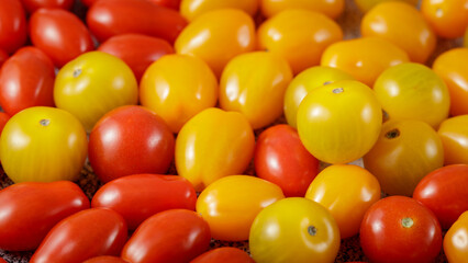 Multicolored cherry tomatoes  on the table.