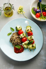 Zucchini skewers with feta and quinoa