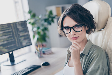 Portrait of intelligent businesswoman contemplating on new project prepare develop website working...