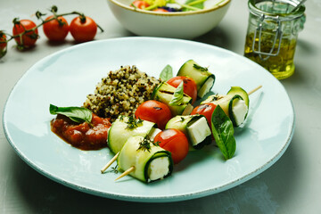 Zucchini skewers with feta and quinoa