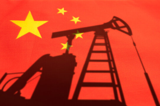 oil industry of china . Oil rigs on the background of the chinese flag. Mining and oil import. trading on global fuel market. Fuel industry concept.