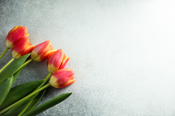 Fresh tulips on a desk