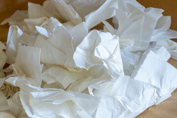 lots of crumpled toilet paper or napkins
