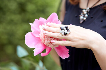 Feminine gentle touch to peonies. Spring and tenderness concept