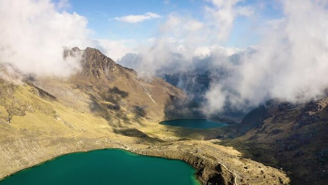 Flying into clouds above the Huaytapallana mountain range in Huancayo - Junin, Peru