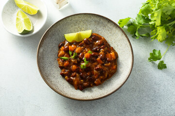 Homemade red bean ragout with vegetables and lime