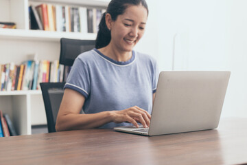 woman work using computer hand typing laptop keyboard contact us.student study learning education online.adult professional people chatting search at office.concept for technology device business